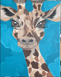 Giraffe portrait on a bright blue background