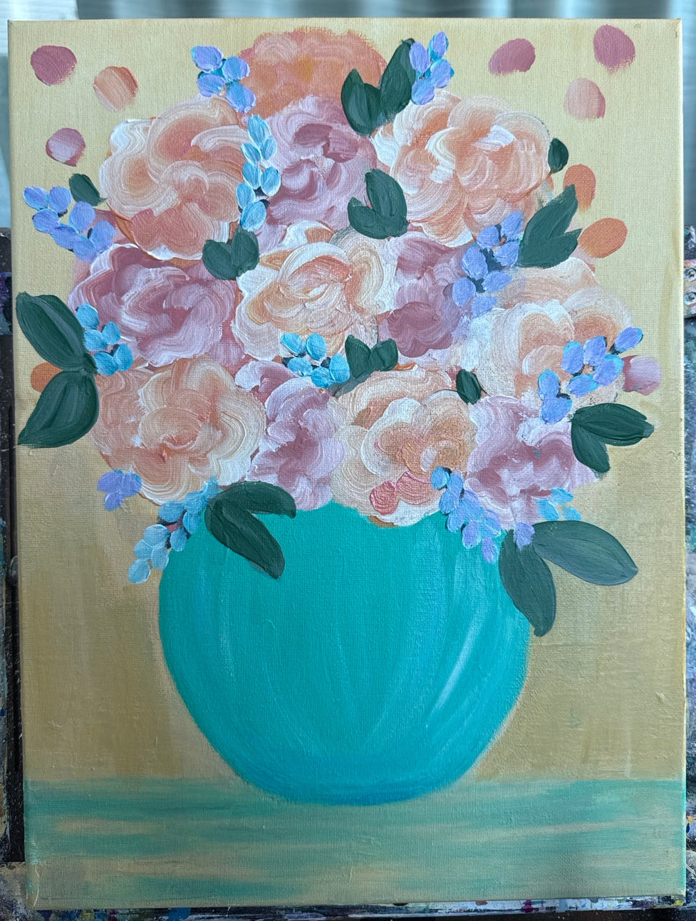 Pastel flowers in a turquoise blue vase